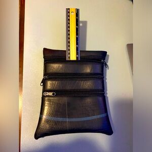 UCA Ruffatti recycled cross body/belt bag.Straps are cut off.Can be used on belt